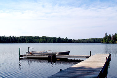 Little Muskie Lake boat pier in Wisconsin vacation resort near Mercer Wisconsin