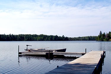 Little Muskie Lake boat pier in Wisconsin vacation resort near Mercer Wisconsin.